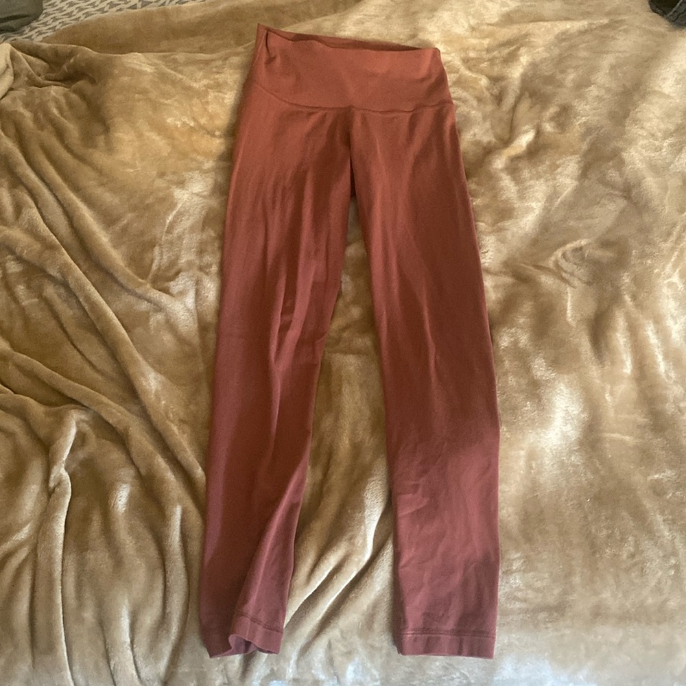 Aritzia TNA TNaction high rise leggings light rust color size small